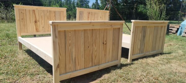 2 single raw wooden kids beds with headboards and footboards