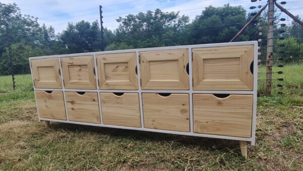 Wooden 10 cube cubby unit white with raw finished doors angled view