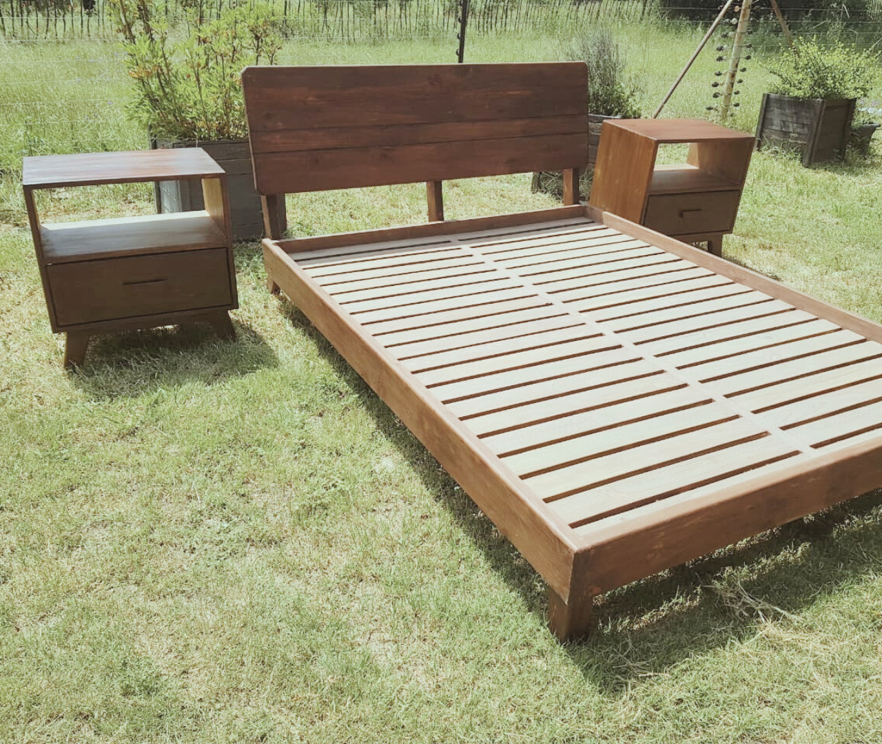 Wooden Bedframe Set displayed outside