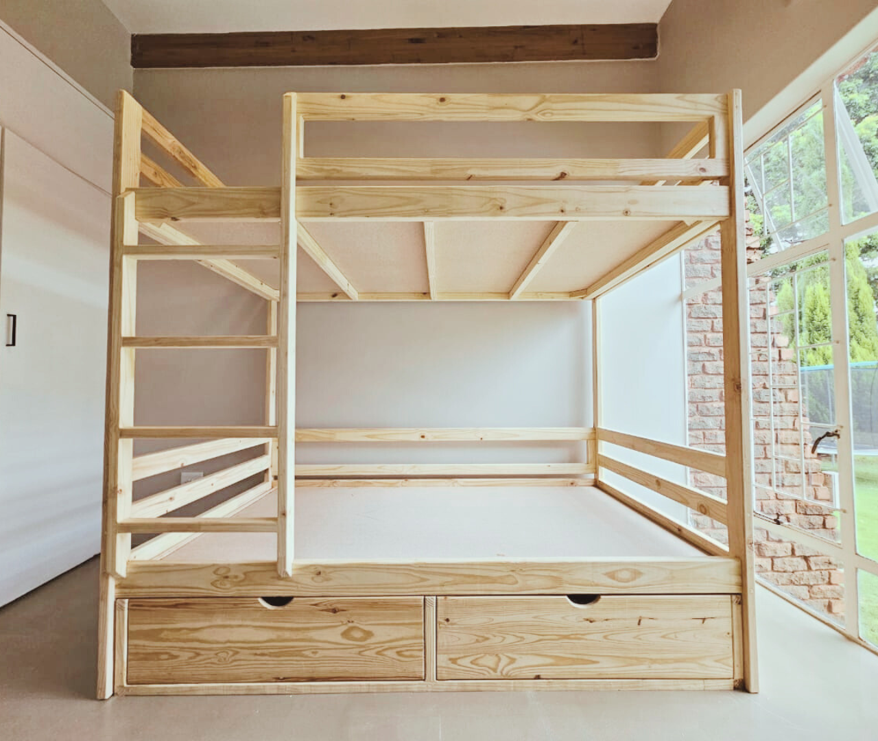 wooden double bunk bed with storage drawers