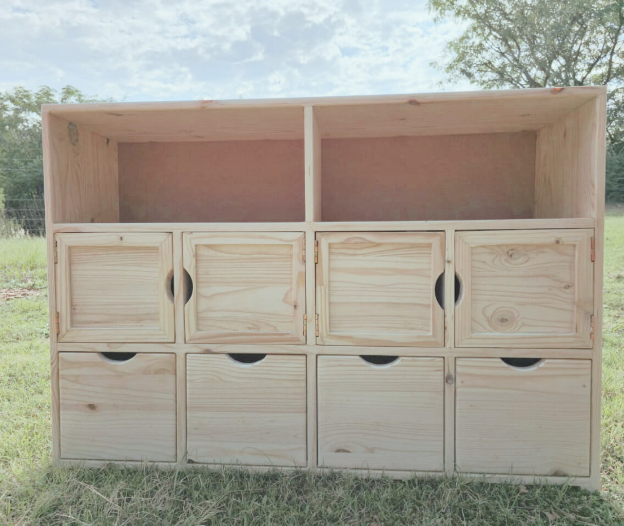 Wooden wall unit displayed outside