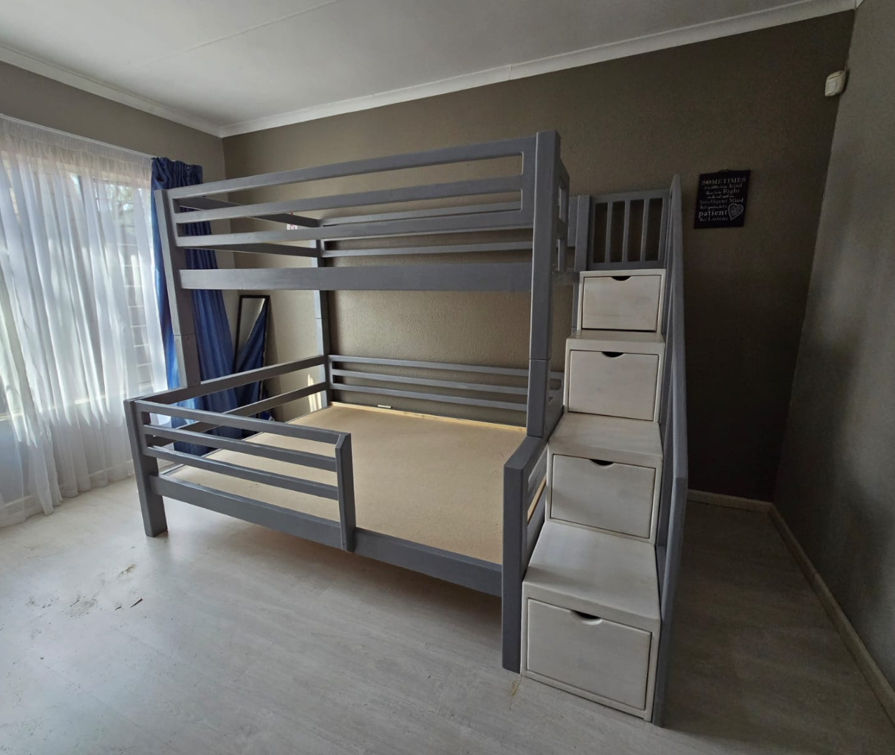 Kids wooden bunk bed with step drawers in grey and white