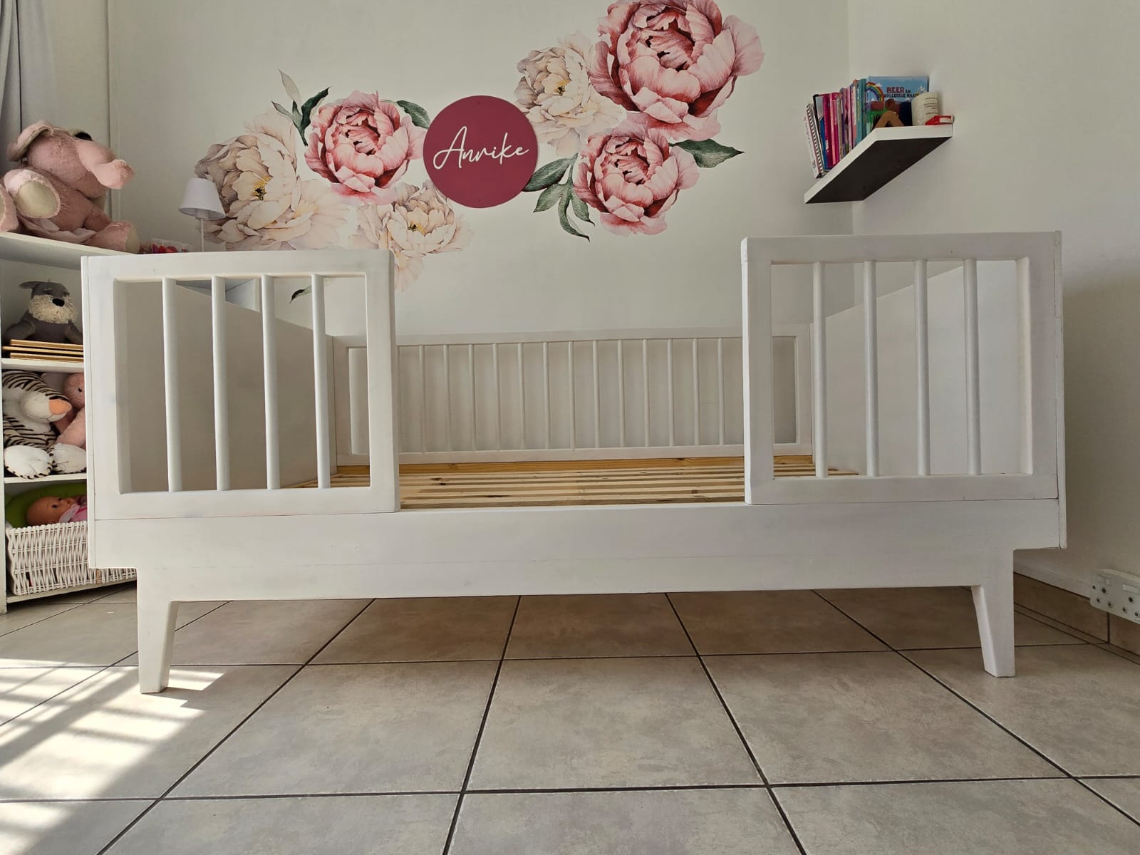 White wooden railed kids bed